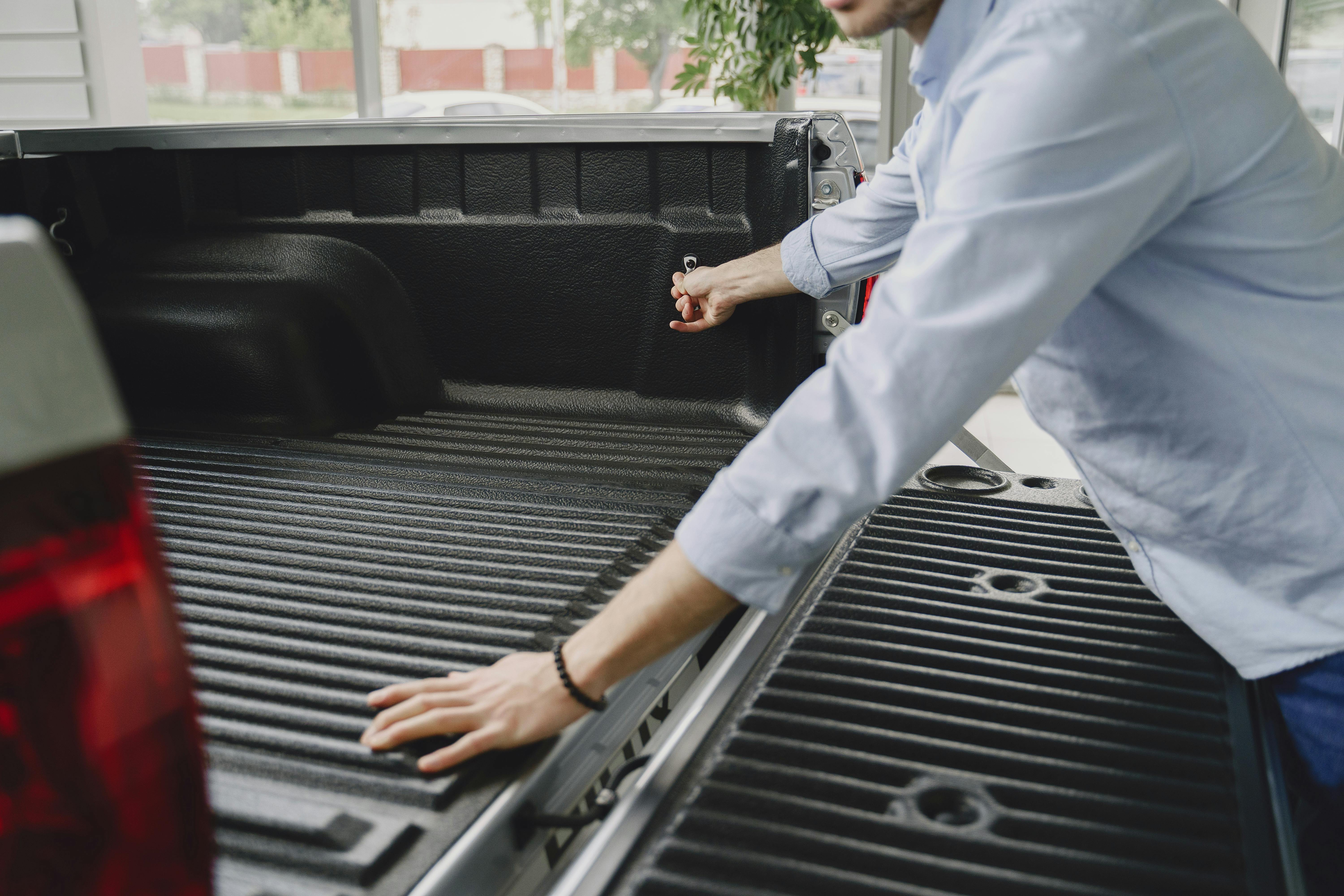 Person opening truck bed